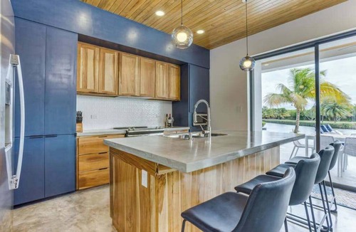Cocoplum Villa | Spacious villa retreat with private pool, rooftop deck, kayaks, and pet-friendly perks