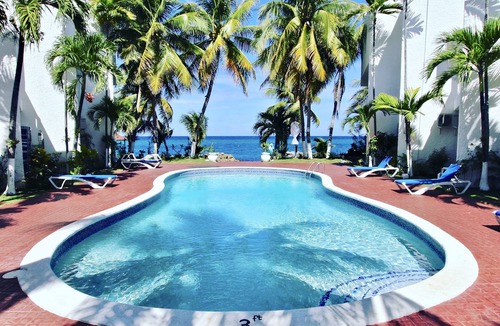 Tower Isle Apartment | SPECTACULAR OCEAN FRONT VIEW, WI FI, POOL, AC, PRIVATE SWIMMING AREA, SECURITY