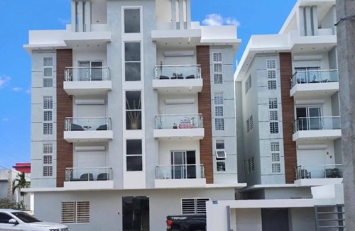 La Romana Condo | Stay at luxurious exclusive condo 10 minute walk from caleta beach