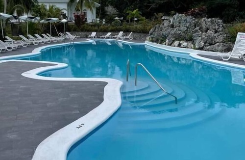 Port Antonio Apartment | Take a boat ride or swim in the beautiful Somerset Falls! FREE Parking & BFast!