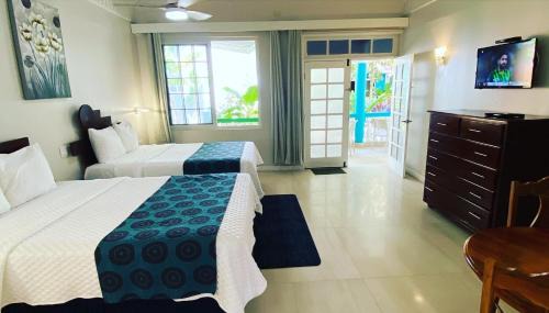 Orange Bay Hotel | THE BOARDWALK VILLAGE