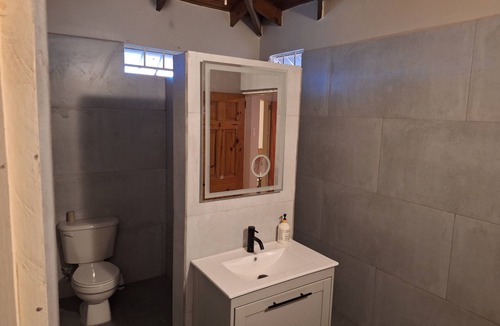 Bon Accord Village House | The Winter House Tobago Walking distance to Store Bay Airport and Crown Point.