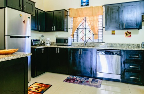 St. Ann's Bay House | Tropical Getaway Villa: Your Family’s Private Paradise with Pool, BBQ. Drax Hall