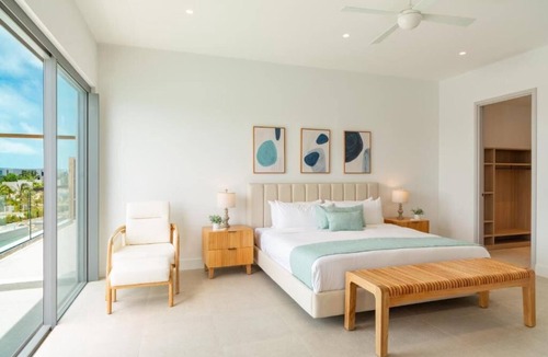 Long Bay Hills Hotel | Turks & Caicos Luxury | Oceanfront Boathouse Villa w/Private Dock & Sea Views