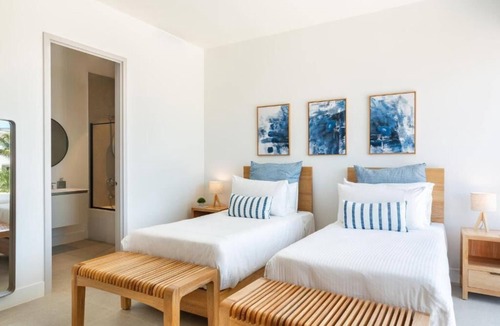 Long Bay Hills Hotel | Turks & Caicos Luxury | Oceanfront Boathouse Villa w/Private Dock & Sea Views