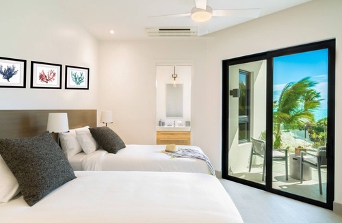 Long Bay Resort | Two bedroom beachfront suite just steps from the beach!