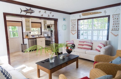 Dunmore Town House | Unique waterfront Harbour Island getaway! 2 house compound with private dock!