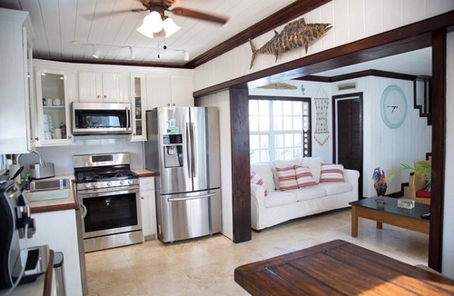 Dunmore Town House | Unique waterfront Harbour Island getaway! 2 house compound with private dock!