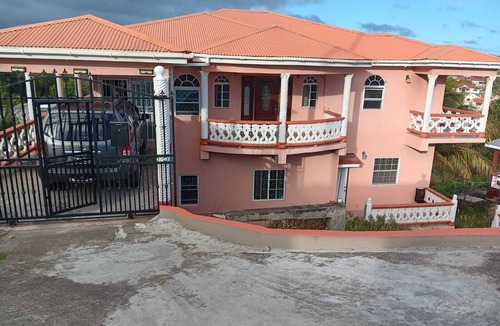 Kingstown House | Unwind at our bright and breezy Prospect loft- your island escape for relaxation