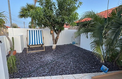 Opal Villa | VillaMango - VillaMango - Aruba's only giant deck chair!