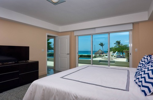 Oranjestad-West Condo | Walk to Eagle Beach – Exclusive 6BR Beachfront Condo with Private Pool & Jacuzzi