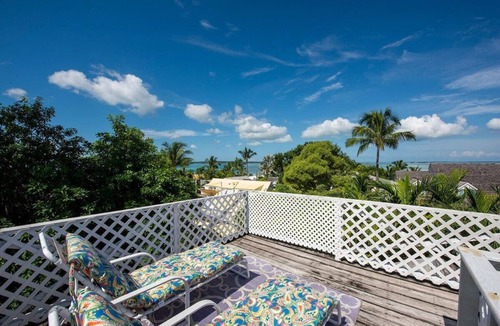 Dunmore Town Cottage | Watercolor a Charming Island Cottage. 3 Bedroom