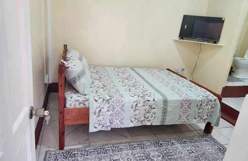 St. Patrick Apartment | Welcoming apartment with AC in charming Sauteurs