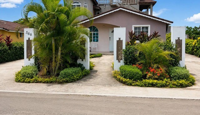 2BR Garden Suite – Minutes from a Glowing Lagoon