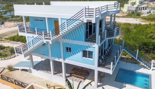 Amazing 2 story oceanfront house with pool, balcony, central AC, & W/D