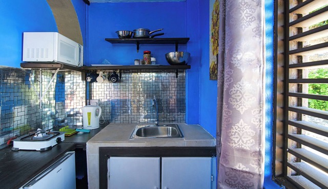 Authentically Caribbean-styled one-bedroom sanctuary near the mall and beach