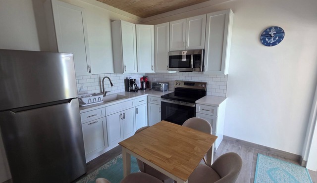 Brand-new 1-bedroom duplex on a beautiful private beach on Russell Island