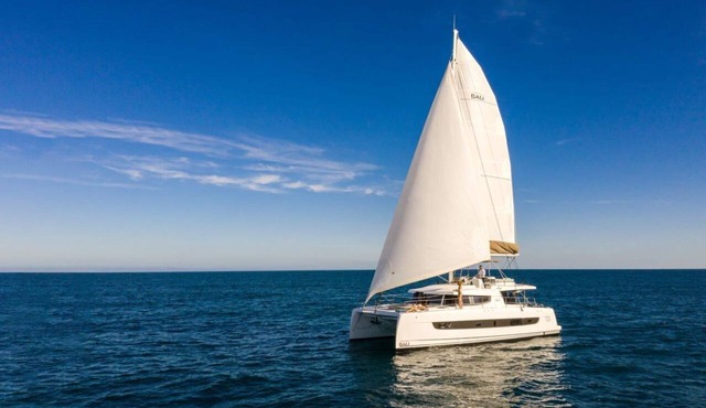 Caribbean Bliss: Sun-soaked Sailing Adventure from Placencia, Belize