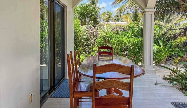 Colorful oceanfront condo with shared pool and jetted tub