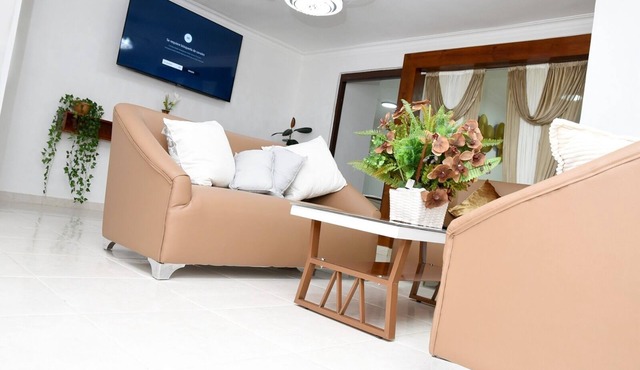 Cozy 1st Floor 2-bedroom apartment in La Vega with WiFi, AC, Self-Check-In