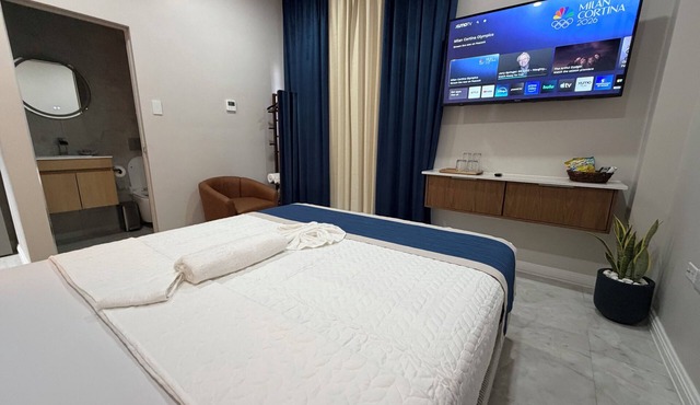 Cozy hotel room with easy access to beaches, shopping, nightlife, and more