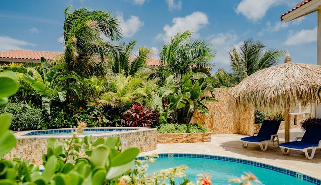 Fabulous modern 2-bedroom apartment with tropical garden, pool and whirlpool