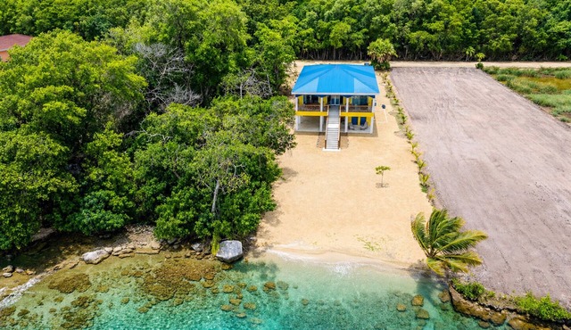 Family friendly beach front two-bedroom home with AC