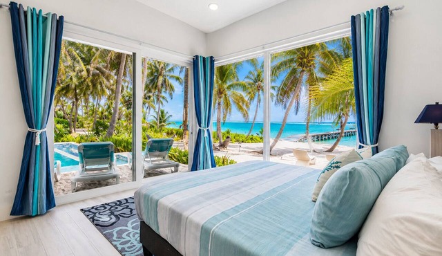 Luxury beachfront vacation rental on Ambergris Caye with a private pool, rooftop lounge, private casita, direct beach access, and full-service concierge. Perfect for families, couples, and group getaways in Belize.