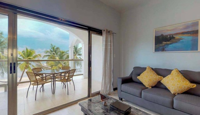Oceanfront condo with amazing water views, partial AC, WiFi & pool