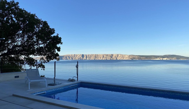 Romantic villa right by the sea with heated private pool in Klenovica