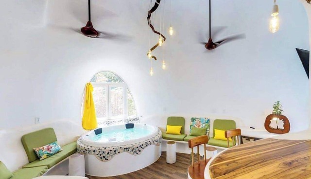 Stunning lagoon-front villa with pool, private hot tub, & AC