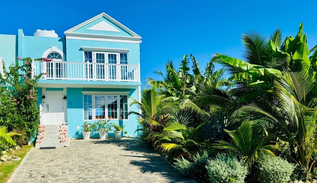 Sunset view oceanfront Jamaican townhome with deck