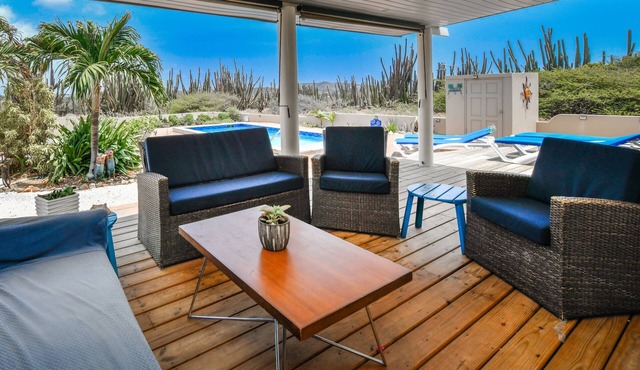 Welcome to our vacation villa in Noord, an oasis of relaxation nestled in nature.