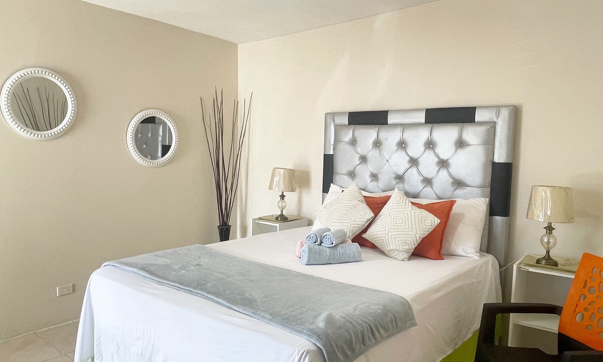 Montego Bay Apartment | Skyline Suites, Breathtaking Mountains & City View 1 Bedroom Apts by RedAwning