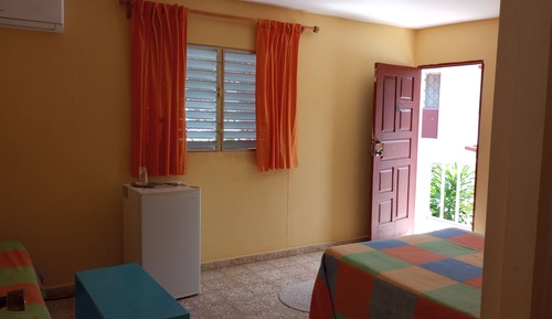 Comfort Quadruple Room, Patio, Courtyard View