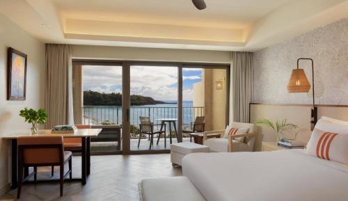 Junior Suite with Balcony and Partial Ocean View