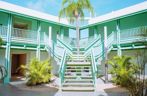 Palm Beach Hotel | The Mill Resort & Suites