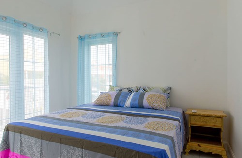 Orange Bay House | Paradise at Little Bay Cournty Club