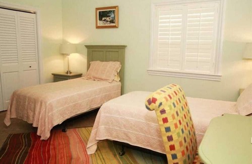 West End House | Green House With Dock in West End Bahamas Old Bahama Day