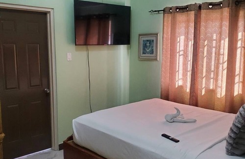 Spanish Town Apartment | Serenity Oasis Apartment
