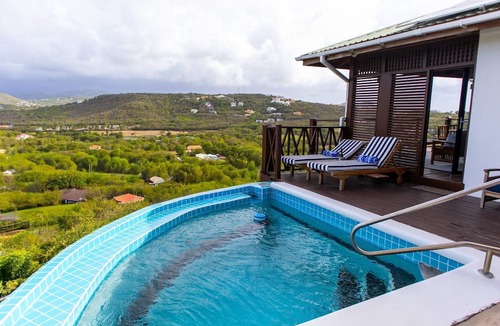 Cap Estate Cottage | Charming Cottage Located In Cap Estate - Orchid Cottage 1 Bedroom Home by RedAwning