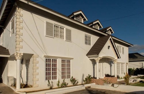 IronShore Estates Apartment | Lawrence Pool House