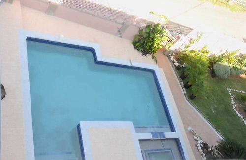 Runaway Bay Villa | 6 Br Peaceful Coastal Getaway with Pool and Beach Access