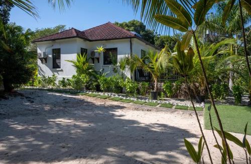 Rock Sound House | The Pilot House - Private 4-Suite Boutique Estate