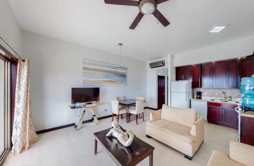 San Pedro House | Beachfront condo with ocean views WiFi partial AC & shared pool dock kayaks
