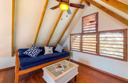 Surfside House | Three forest cabanas with verandas hammocks WiFi & partial AC - walk to beach