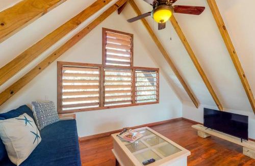 Surfside House | Three forest cabanas with verandas hammocks WiFi & partial AC - walk to beach