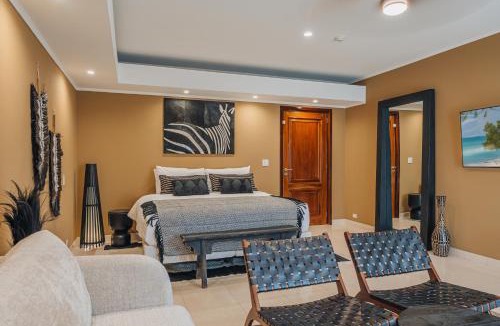 Bubali Villa | Grand Luxury Villa, 2 min Eagle Beach, 7 Rooms, Gym, Billiard Pool, HotTub, Piano and more!