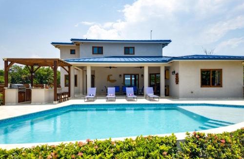 Caribbean Way Villa | South Gull - 5 Bedroom Beachfront Villa w Large Pool Staff