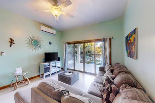 Relaxing condo with shared pool ocean views partial AC & WiFi